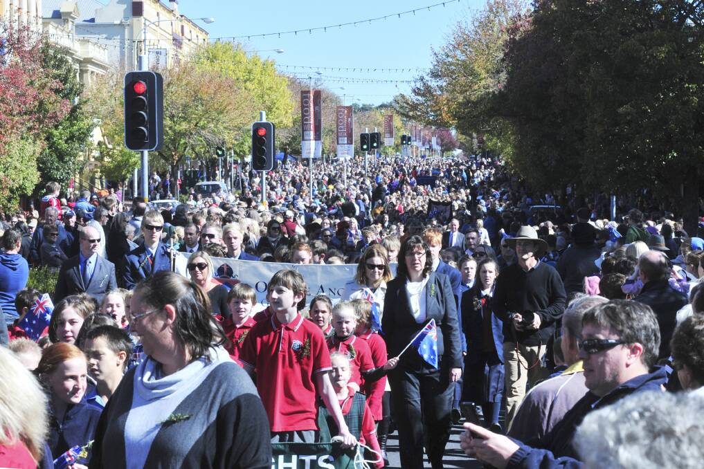 STANDING ROOM ONLY: The ANZAC Day march. Photo: JUDE KEOGH