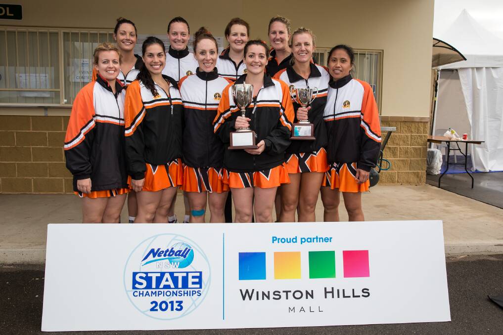 WINNERS ARE GRINNERS: Orange's open netball team took out the Pat Weston Country Championships Cup in 2013, as well as finishing third at the Netball NSW State Championships.