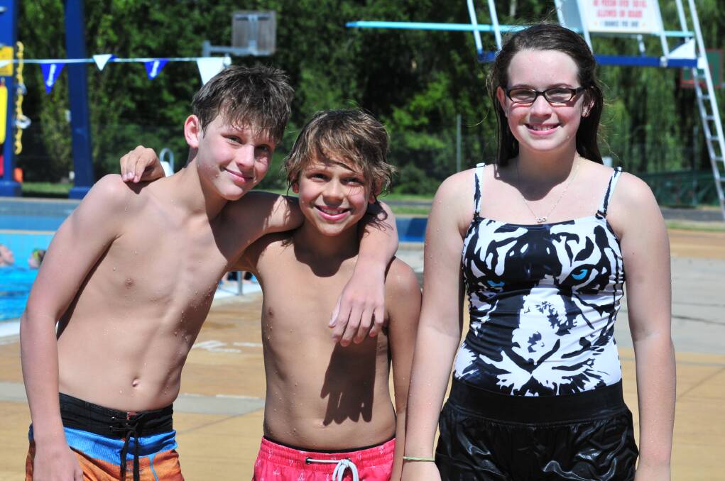 POOL: Justin and Bradley Rind with Emaleigh Forsman. Photo: JUDE KEOGH