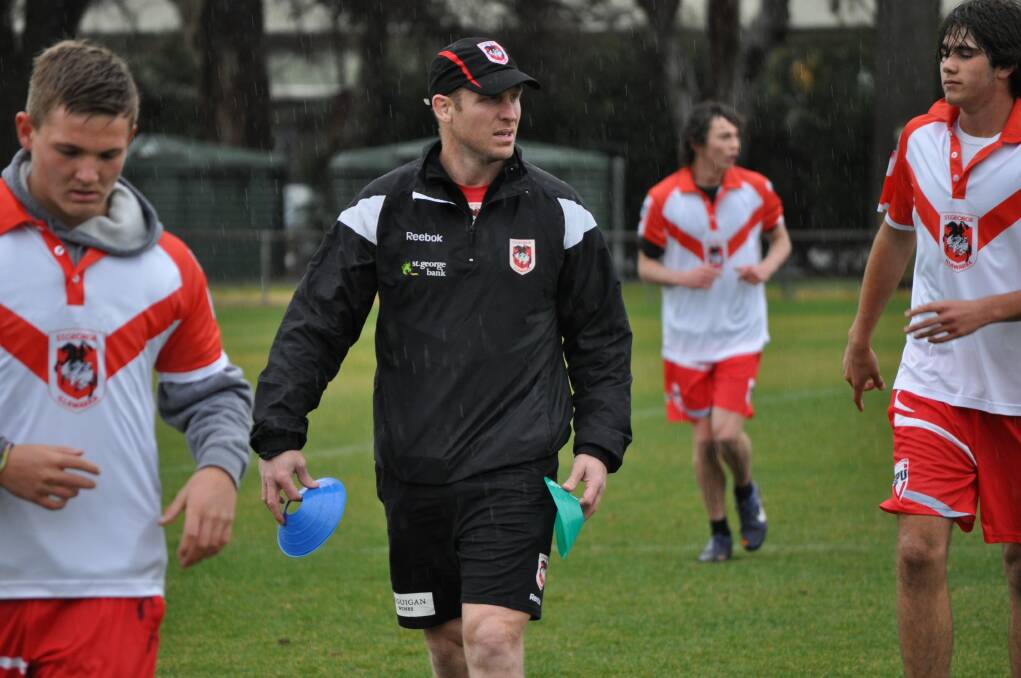 August 13 - Former St George-Illawarra Dragons Ben Hornby was assisting with the Dragons' High Performance Unit, scouting Orange talent at a Wade Park training session. Fellow former player Dean Young was also there. Photo: NICK MCGRATH 0812nmdragons2