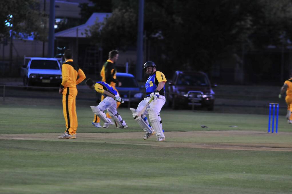 CRICKET: Orange City duo Dave Boundy and Shaun Grenfell turn for a second run in their Royal Hotel Cup game against Blayney at Wade Park on Friday night. Photo: JUDE KEOGH