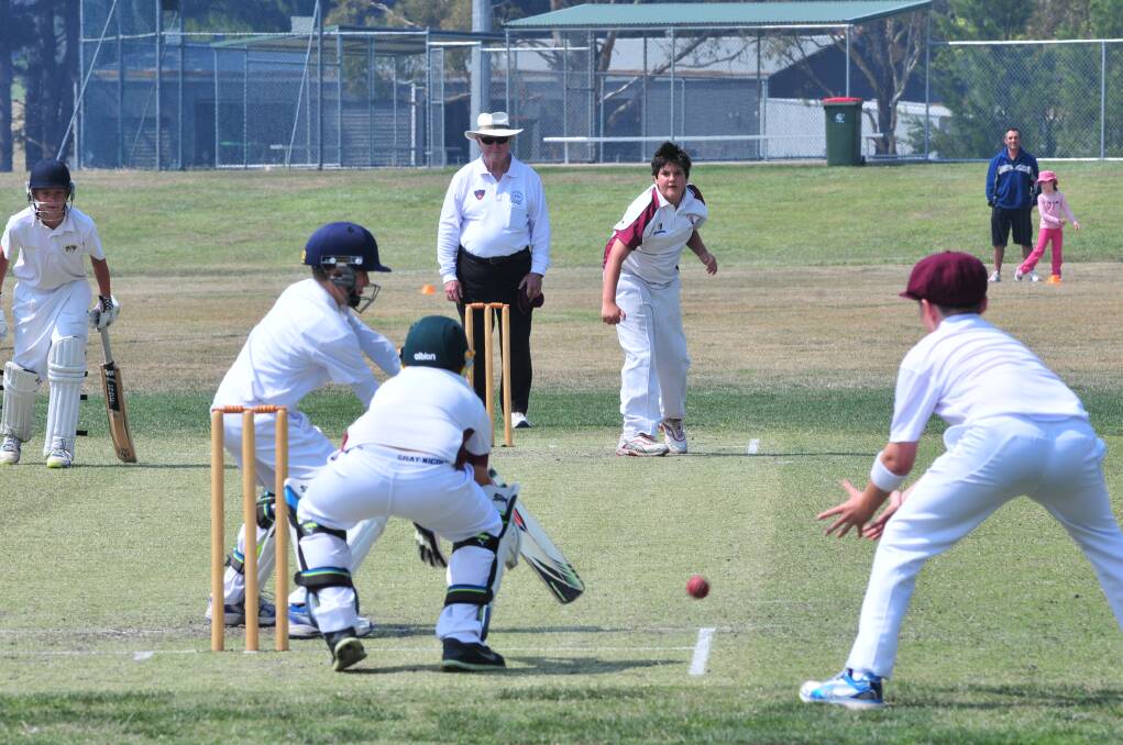 Shoalhaven's Riley White bowls to Lachlan's Jacob Lucas at Sir Jack Brabham Park on Tuesday. Photo: JUDE KEOGH