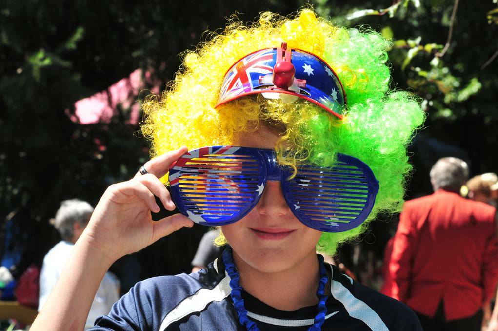 ORANGE: Ryan Baker gets into the spirit of the celebrations at Cook Park on Australia Day. Photo: JUDE KEOGH