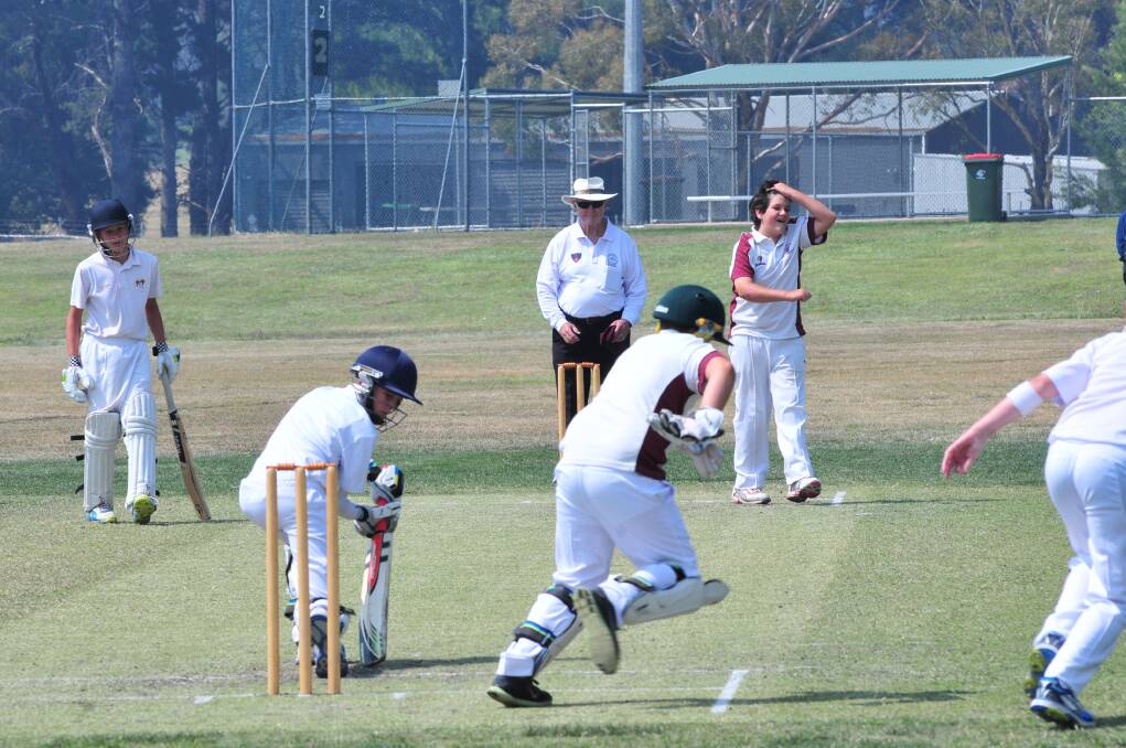 Shoalhaven's Riley White bowls to Lachlan's Jacob Lucas at Sir Jack Brabham Park on Tuesday. Photo: JUDE KEOGH