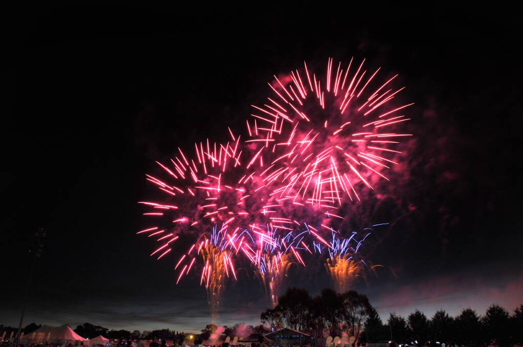 PARTY TIME: The fireworks light up the Orange skyline. Photo: STEVE GOSCH