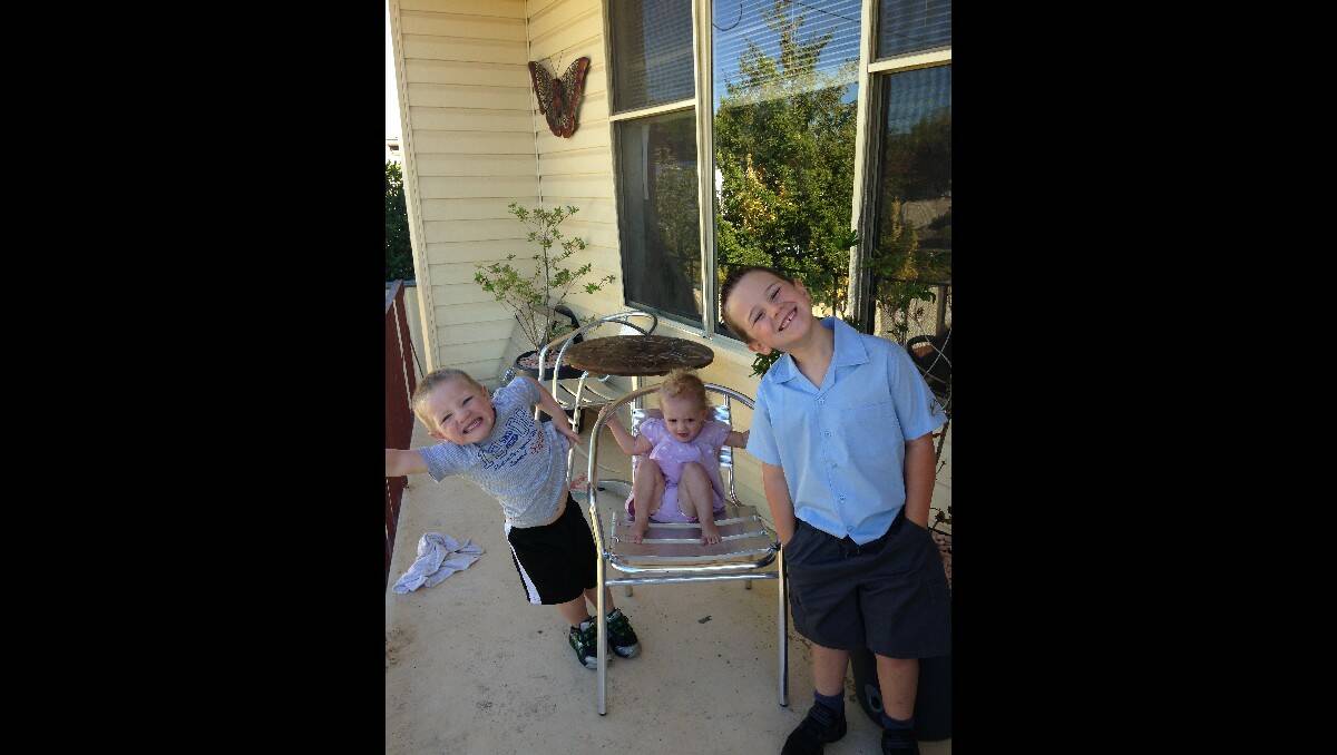 Zachary (5) on his first day of kindergarten at Bletchington Public School with Malachi (3), who is starting Trinity Preschool and Indigo (1), who misses her big brothers.