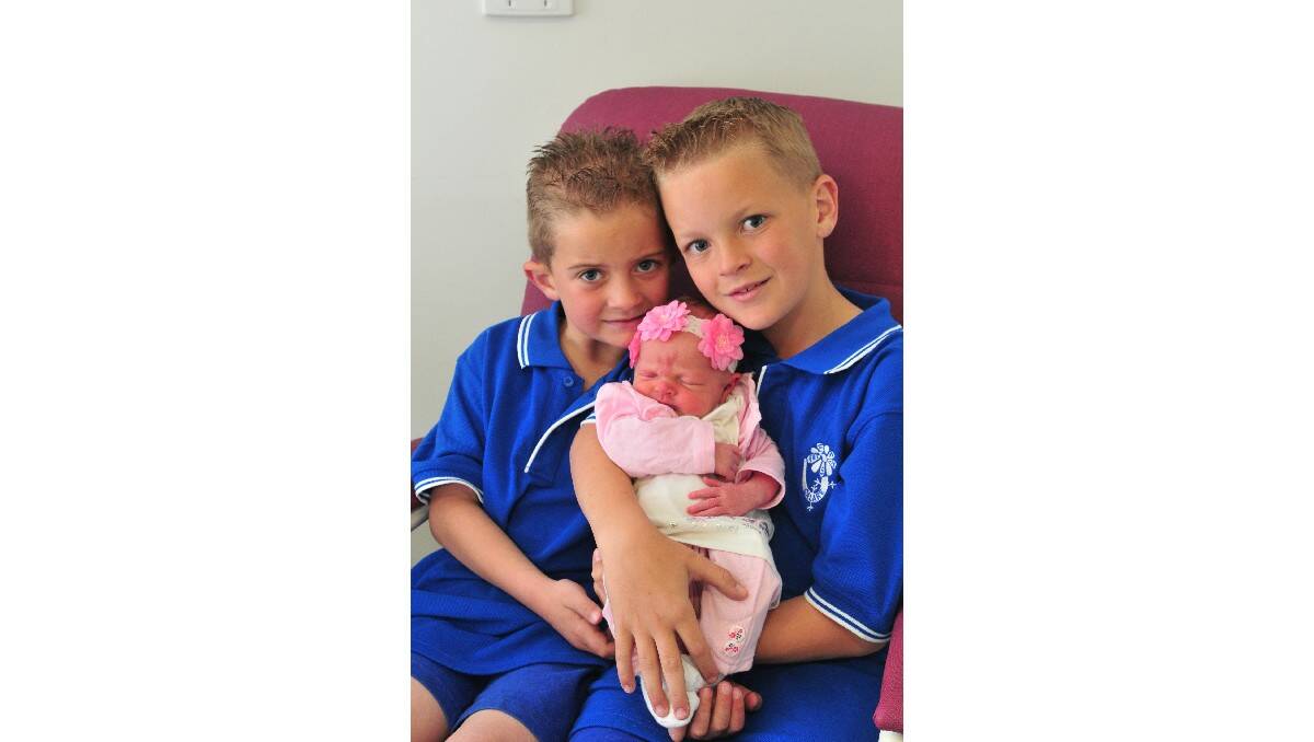 Zanna Dolbel, pictured with her older brothers Blake and Ryan, was born on September 12. Her parents are Kirsty and Craig Dolbel.