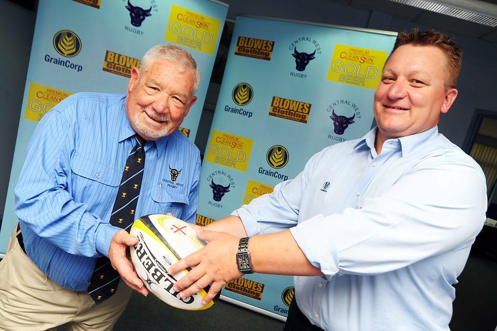 Central West Rugby Union chief executive Peter Veenstra with GrainCorp s Wayne Earl at the announcement of the GrainCorp Cup competition. Photo: BELINDA SOOLE