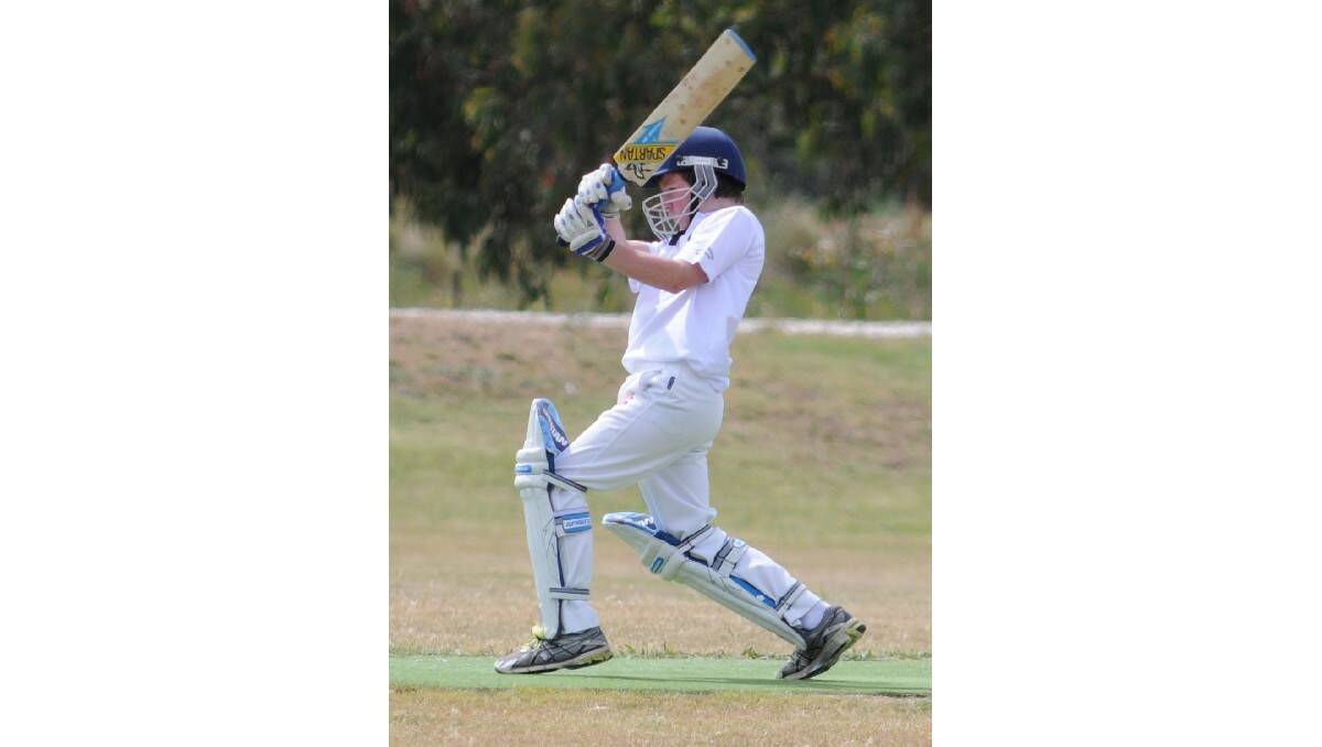 CRICKET: Harry Manuel hits out in the Cavaliers and SJS-CYMS game on Saturday. Photo: STEVE GOSCH