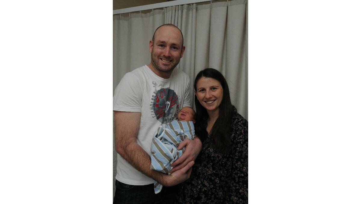 Isaac Aiden Mullins, pictured with parents Paul Mullins and Sarah Powell, was born on August 16.