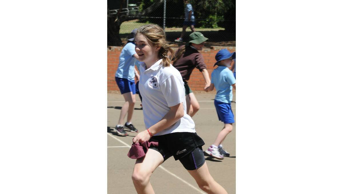 CATCH ME IF YOU CAN: Gabby Hart from Canobolas Public School enjoyed herself. Photo: STEVE GOSCH