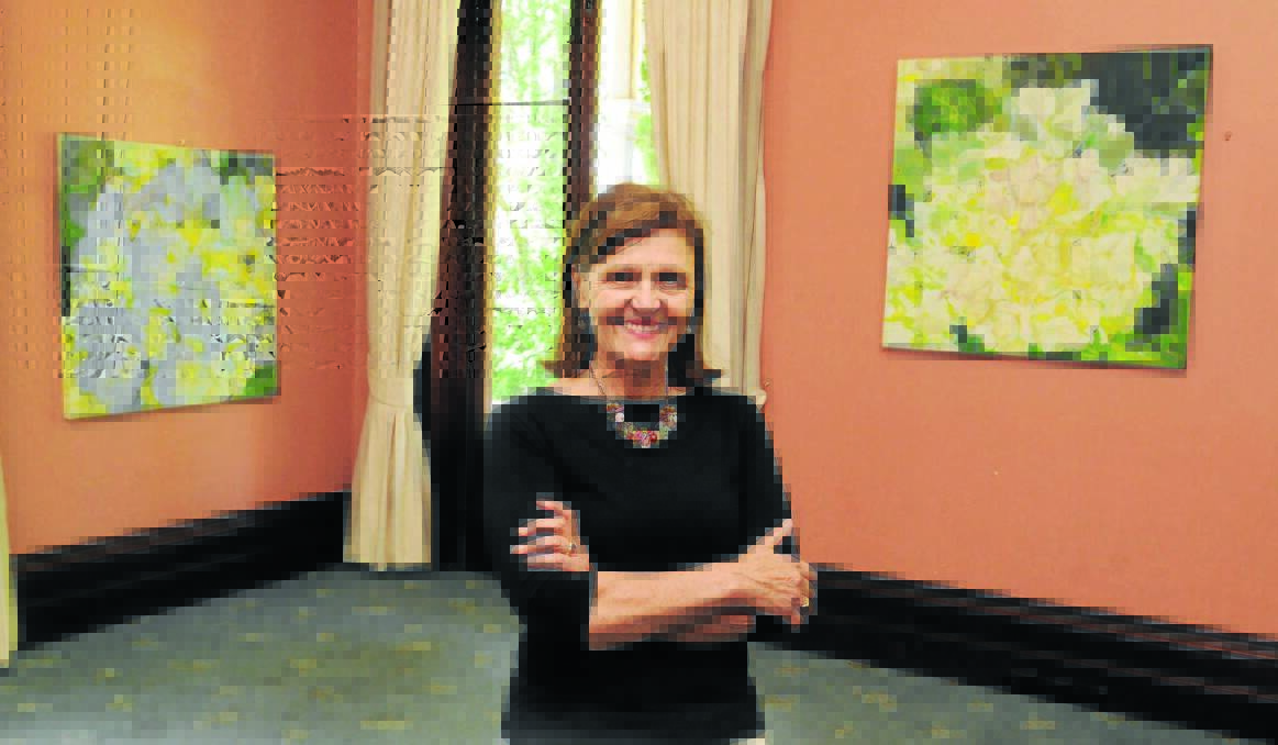 BLOOMING BEAUTIFUL: Artist Helena McConochie’s travelling exhibition Natures' Masterpieces will open tonight. Photo: STEVE GOSCH                                                                                                                                    1118sgmcconochie1
