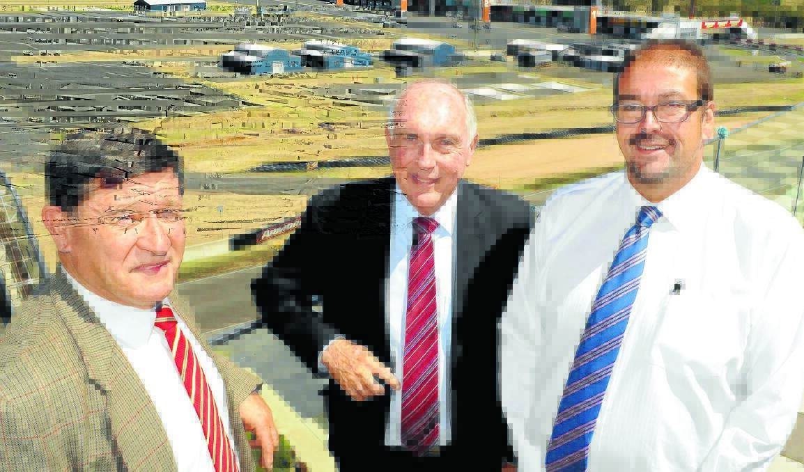 THREE WISE MEN: Federal member for Calare John Cobb, Deputy Prime Minister Warren Truss and Orange City Council general manager Garry Styles at Mount Panorama in Bathurst yesterday. Photo: CHRIS SEABROOK
