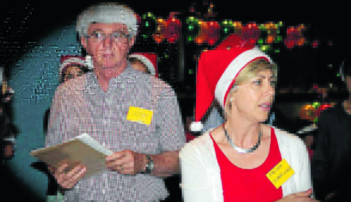 CHRISTMAS CHEER: Orange Community Christmas Lunch co-ordinators John Webb and Melissa Brown were kept busy with hundreds of people flocking to the festive event. Photos: SAMANTHA COLLITON contributed
