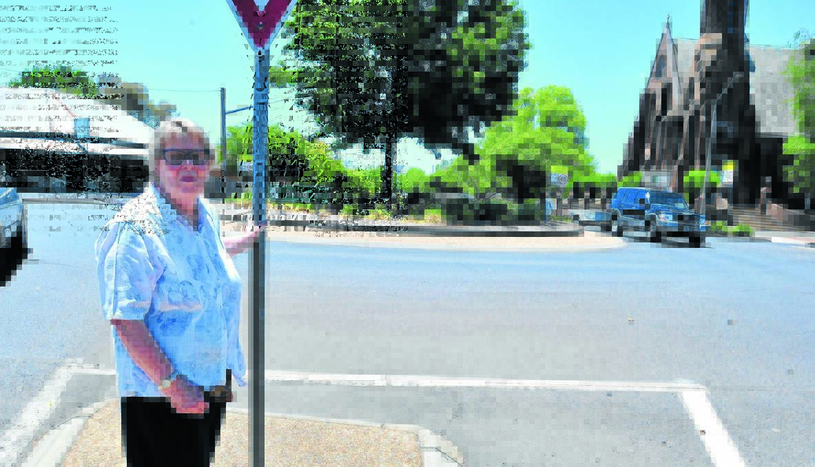 DANGEROUS CROSSING: Joan Brown says the roundabout on the corner of Byng and Hill streets is a hazard for elderly pedestrians whose vision and reflexes are not as sharp as they could be. Photo: JUDE KEOGH                                                                               0129bynghill4