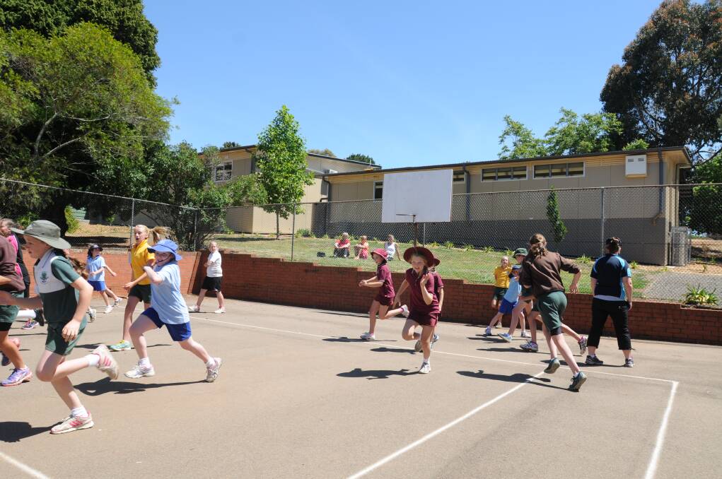 FUN AND GAMES: Small schools students come together to enjoy themselves at Canobolas Public School. Photo: STEVE GOSCH