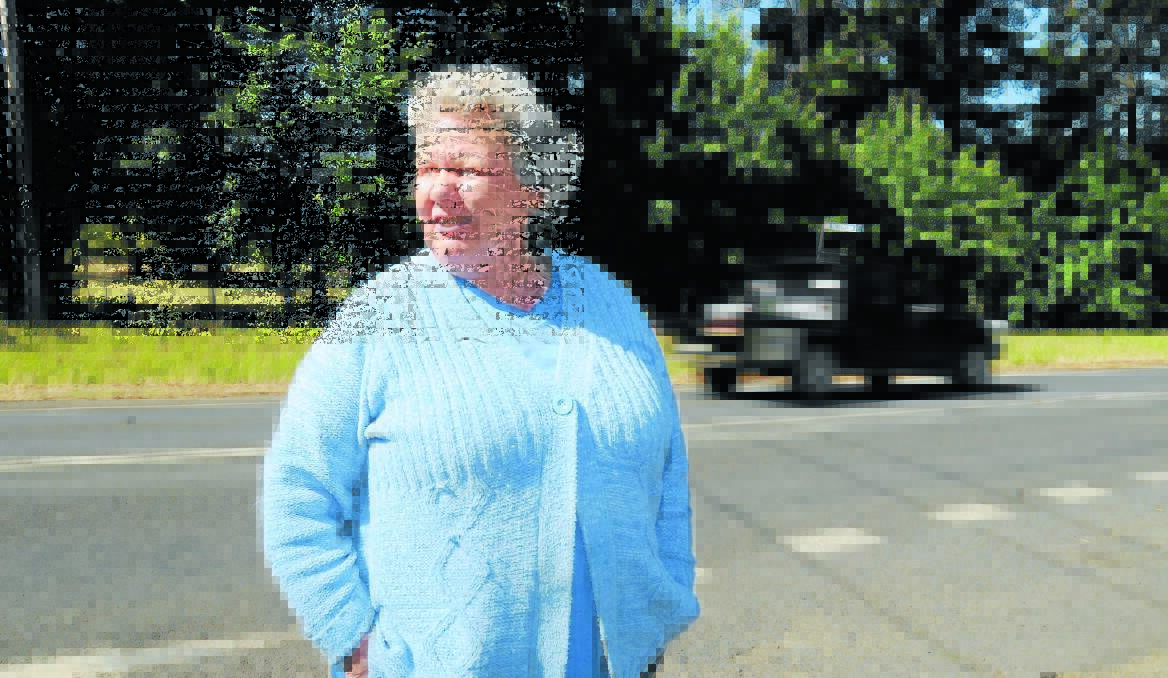 SLOW RESULT: Noreen Towers was lucky to escape injury when her car was written off in an accident at the intersection of Yackerboon Place and Cargo Road. She wants the 50km/h zone to be moved further out of town. Photo: STEVE GOSCH                                                                                                           1206sgspeed1