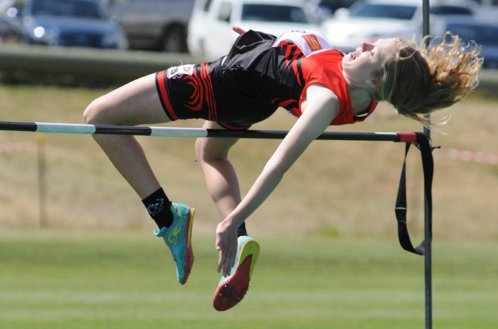 HITTING THE HEIGHTS: Orange Little Athletics Club hosted the zone championships at Waratah Sportsground on the weekend. Photo: STEVE GOSCH
