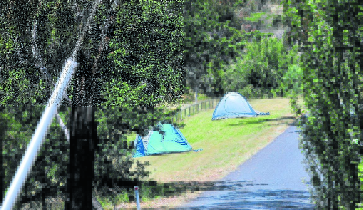 TENT CITY: Tents still lined Lake Canobolas Road yesterday afternoon but there were reports up to 60 people camped on the roadside on Thursday night.