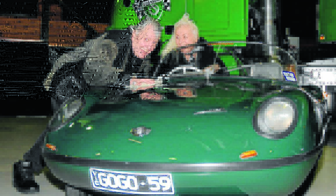 FAMOUS CAR: Actor Tommy Dysart and his partner Joan Brockenshire with the Shannons Goggomobil Dart that will be on show at next Saturday’s Gnoo Blas Classic car ahow. Photo contributed