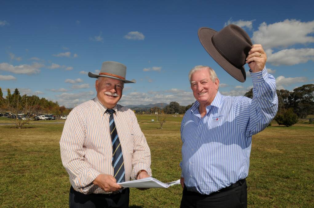 IF THE HAT FITS: Cr Chris Gryllis and mayor John Davis support a monument to Banjo Paterson. Photo: STEVE GOSCH