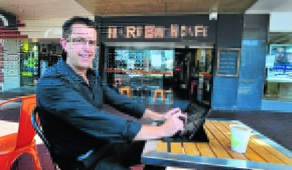 TAP IN: Councillor Ash Brown believes free Wi-Fi internet in Orange’s central business district would be a tourist drawcard and benefit businesses. Photo: STEVE GOSCH 0220sgwifi