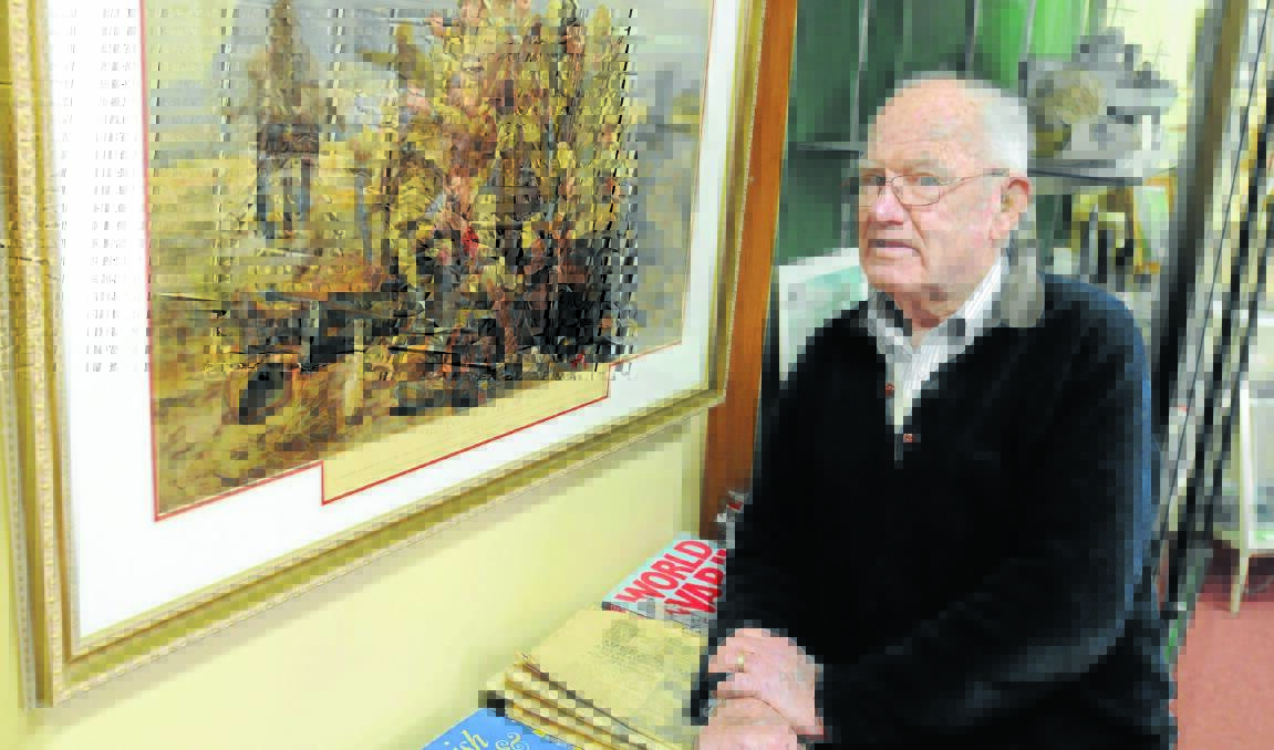 REMEMBERING BOER WAR: Les McGaw from the Returned Services League will lead the service tomorrow morning at the Boer War Memorial in Robertson Park. Mr McGaw is pictured in the RSL Museum with some of the relics of the war. Photo: STEVE GOSCH                                                                                         0524boerwar