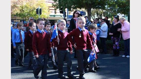 Marching along Summer Street in Orange during this morning's Anzac Day commemoration services. Photo: Michael Whiley Photography