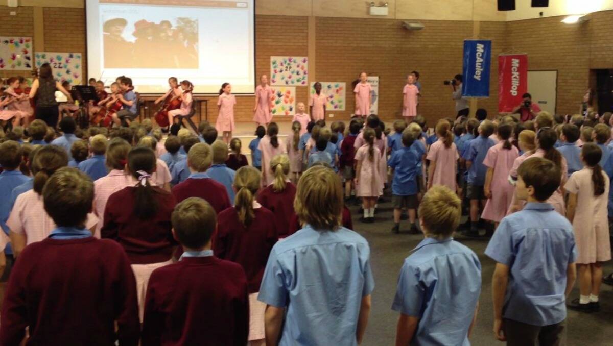 SING: Students from St Mary's Primary School were among 600,000 children across Australia singing to the same beat.