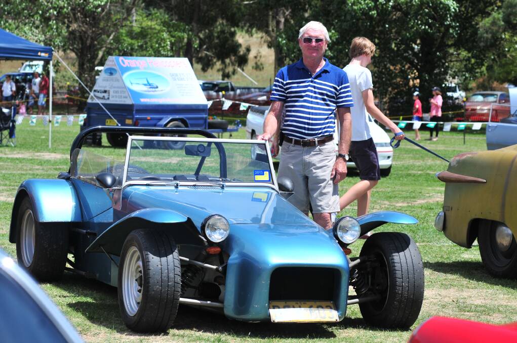 Harry Galloway with his car that he built by hand. He began building it in 1968 and finished 1970.