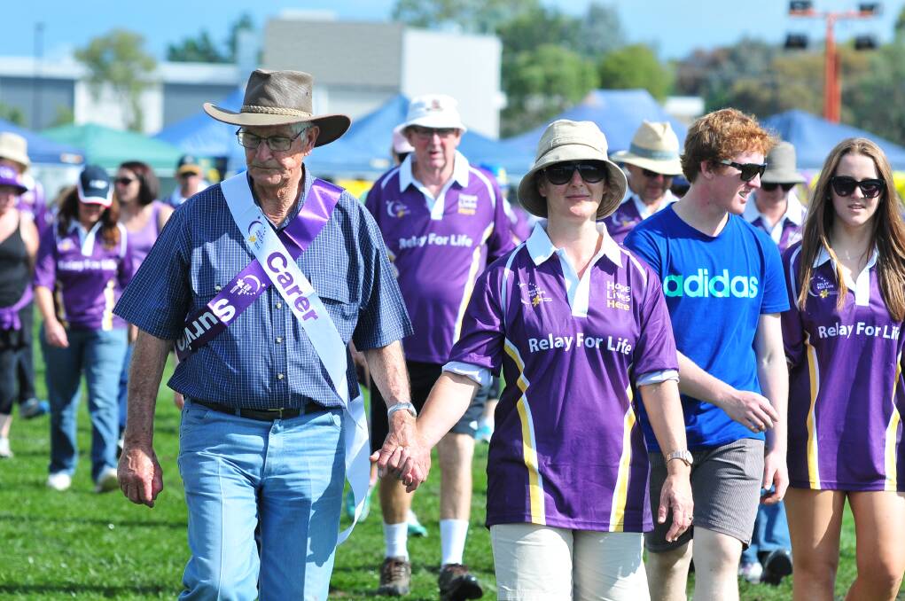 RELAY FOR LIFE: Andrew Wood with daughter Alison Logan. Photo: JUDE KEOGH