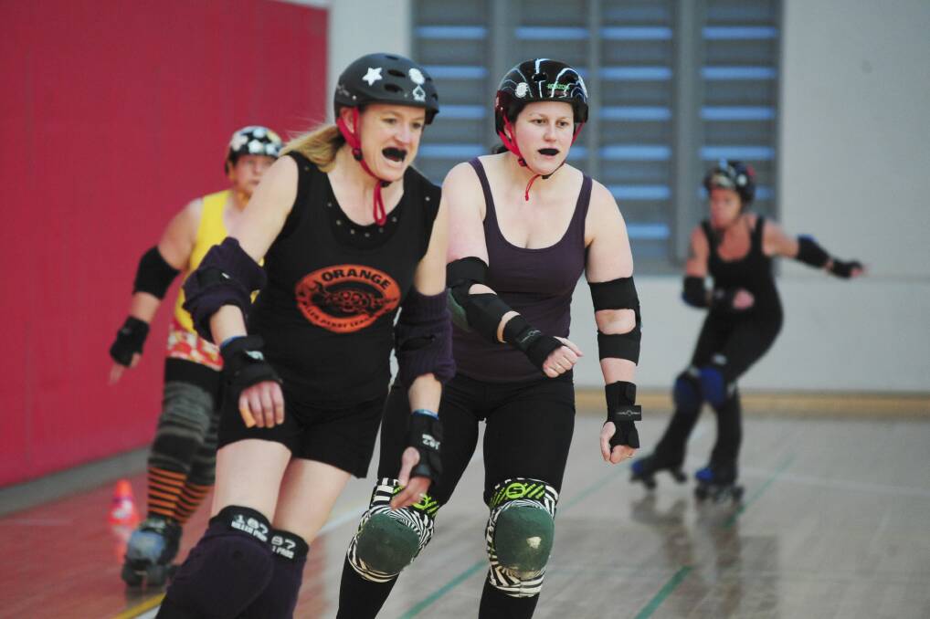 Orange Roller Derby League Training - Incredibelle Olk & Robyn Zombie Photo Jude Keogh