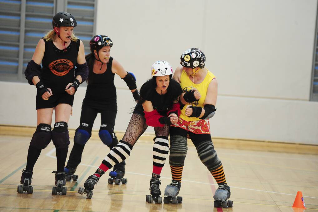 Orange Roller Derby League Training - Incredibelle, Madam Mixalot, Le'Evil Kni'Evil & Tinkers Toss Photo Jude Keogh