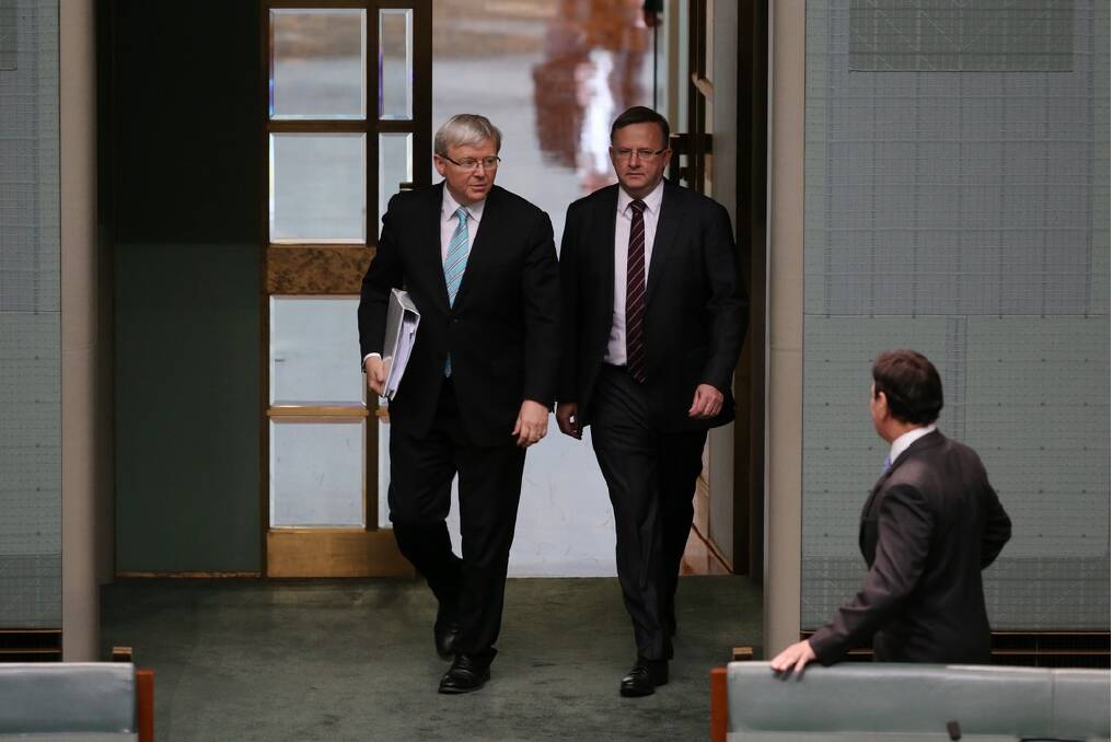 Prime Minister Kevin Rudd returns the House of Representatives with Deputy Prime Minister Anthony Albanese. Photo: Andrew Meares. 