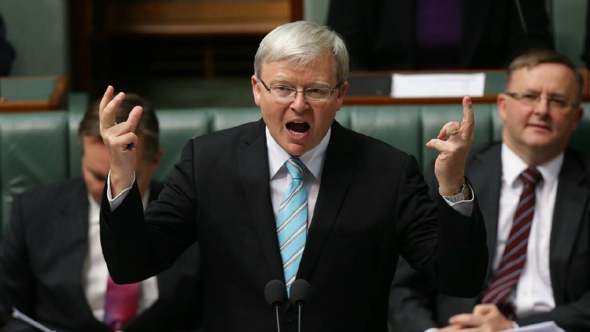 Prime Minister Kevin Rudd returns the House of Representatives at Parliament House in Canberra. Picture: Alex Ellinghausen  