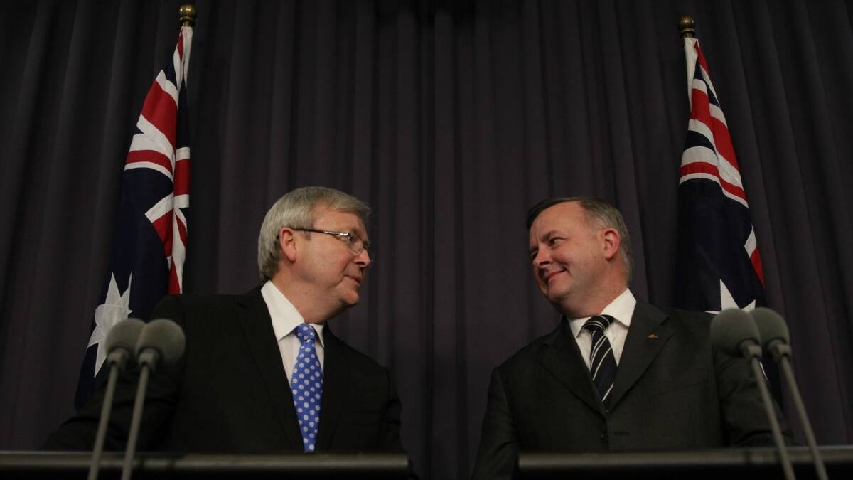 Kevin Rudd and Anthony Albanese address the media after being elected Labor leader and deputy leader on Wednesday night.  