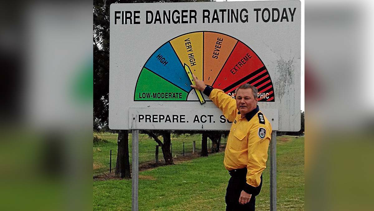 MUDGEE: Andrew Williams of the local RFS updating one of the Fire Danger Meters in the district. The bush fire season began on Tuesday. PHOTO BY JAYNE LEARY