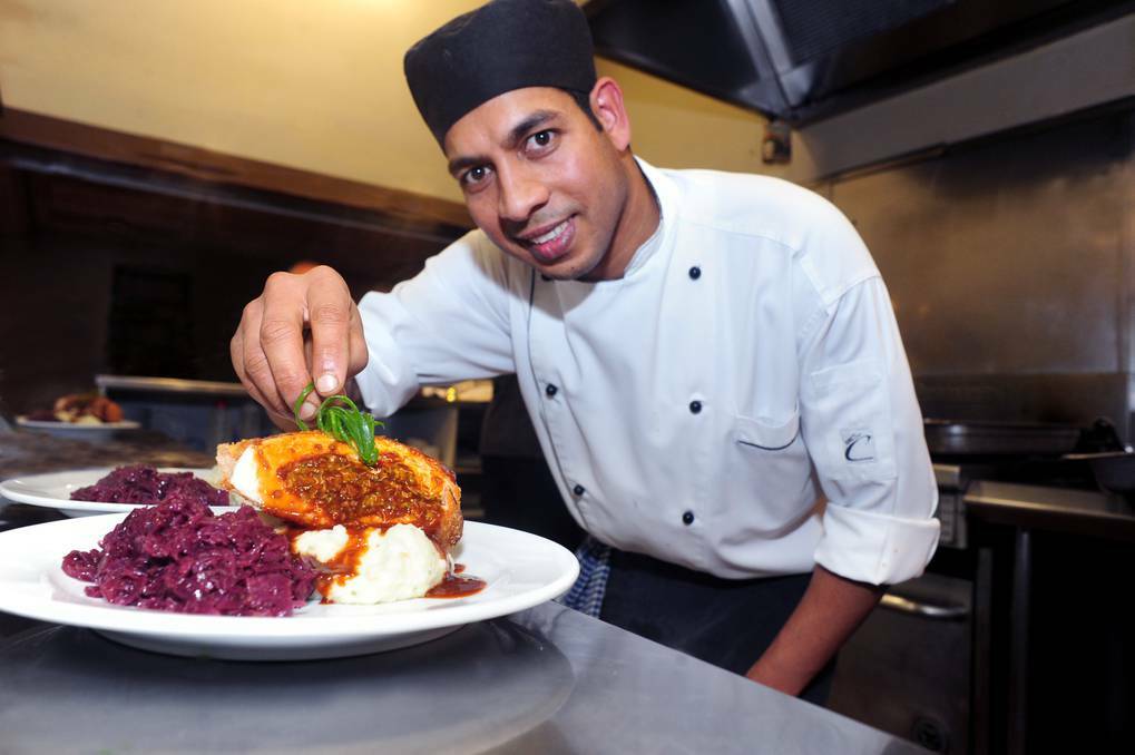DUBBO: Commercial Hotel head chef Brian Perera serves up a treat for Dubbo diners. Photo: LOUISE DONGES