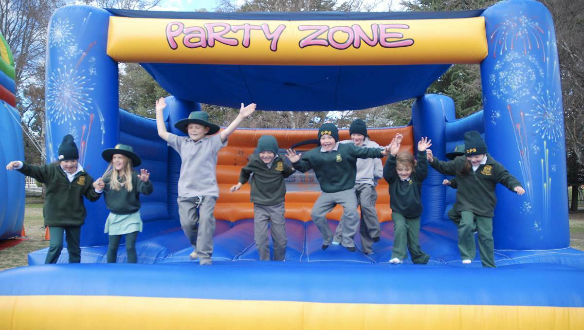 LITHGOW: Students at Cooerwull Primary School have been rewarded with a slippery slide and bouncing castle. Pictured from left, Grace Collins, Zoe Morgan, Alex Grant, Ryan Gill, Deklin Unsworth, Aaliyah Lake and Ambrozia Cummings. lm080613jump5