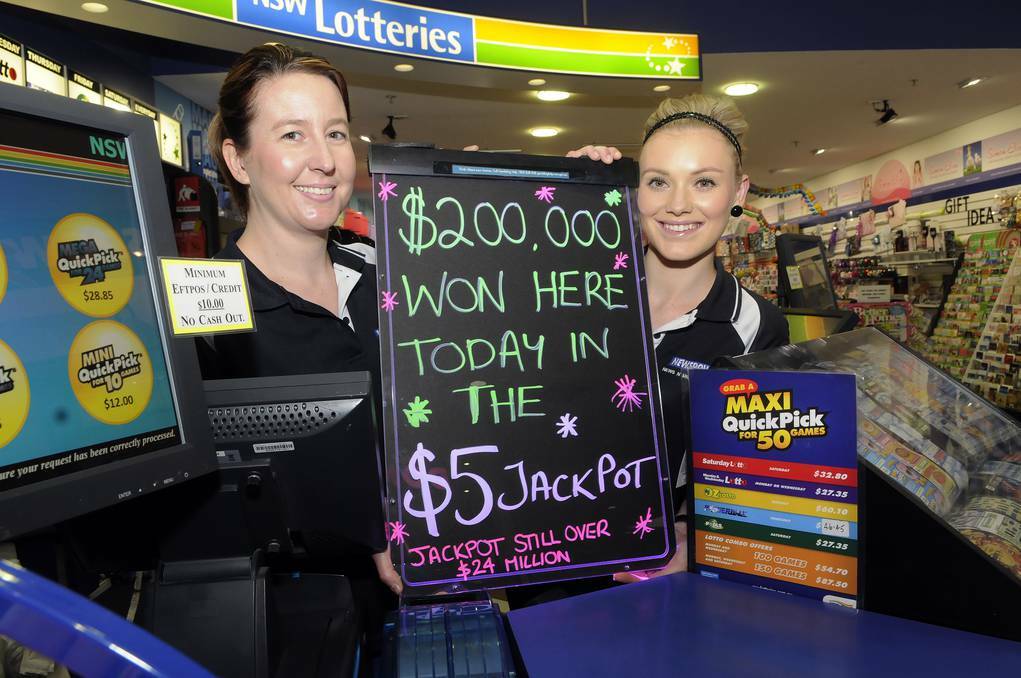  Stacey Buttsworth and Emily Rogers from News ’n’ More Newsagency in the Stockland Centre are over the moon after selling a winning first prize ticket worth a cool $200,000 in the $5 Jackpot lottery. Photo: PHILL MURRAY