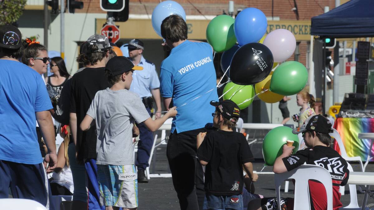 Races visitors and Bathurst locals flooded Kings Parade on Saturday for the annual Great Race Street Fair. Photo: Chris Seabrook.