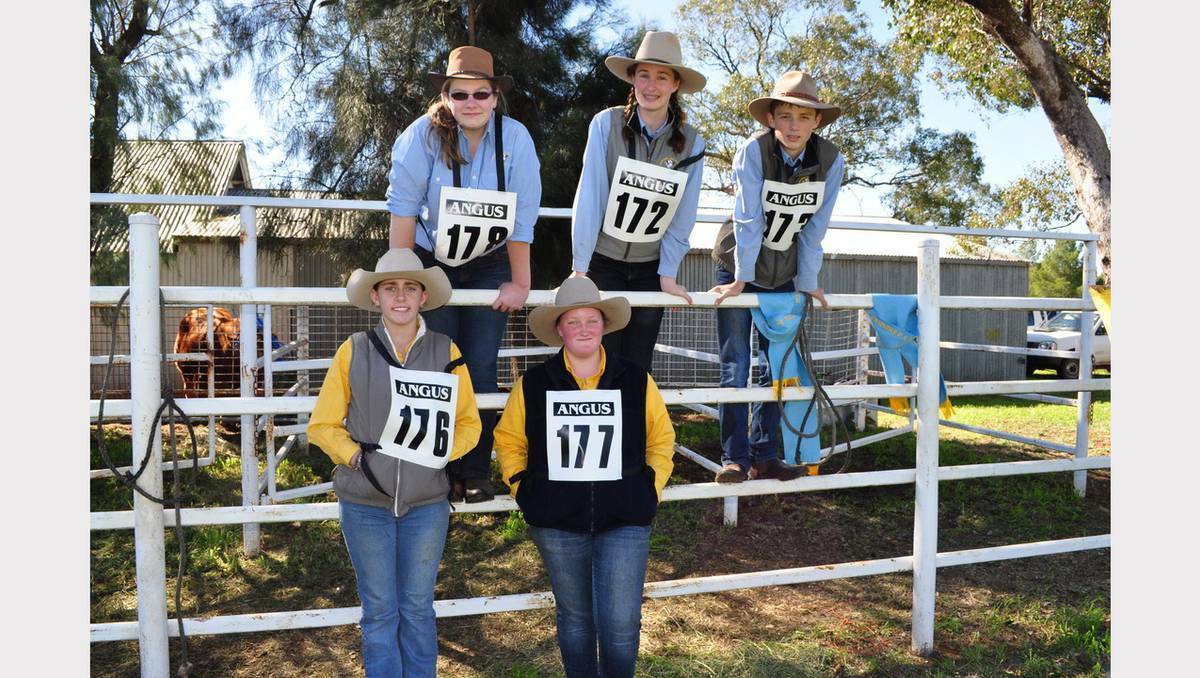 PARKES: Students from Narromine High School paraded cattle in the Junior section at the Trundle Show – pictured (back-row, left to right) Sophie Walker, Maddy Preston and Harry Moore; front: Kim Grinsell and Megan Willoughby.