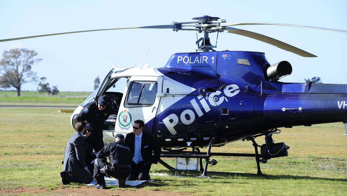 DUBBO: PolAir 1 landed at Dubbo on Thursday on its way west to search for missing resident Alois Rez. Photo: BELINDA SOOLE
