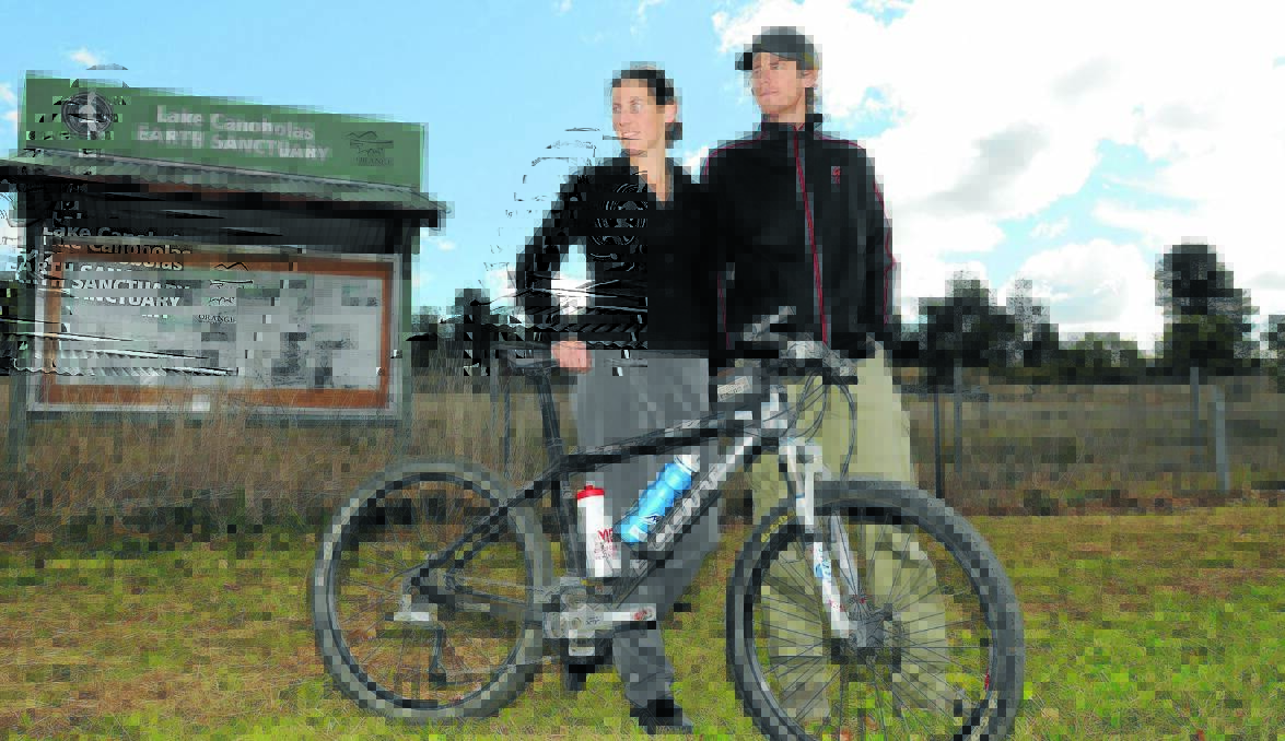ALONG FOR THE RIDE: Kate Heynes and Rodney Farrell of Central West Off Road Bike Club are excited about building a mountain bike trail at Lake Canobolas earth sanctuary. Photo: Steve Gosch0528bikes