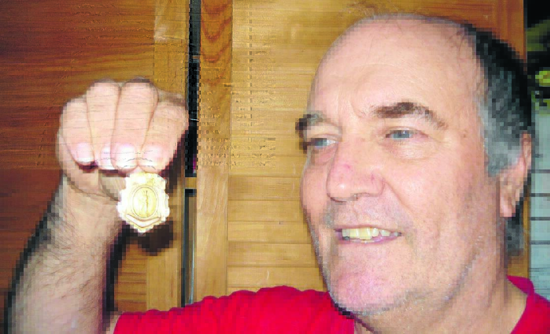 HAPPY RETURNS: Neil Goldthorpe says he was happy to surrender the World War I medal he found in his parents’ belongings. 