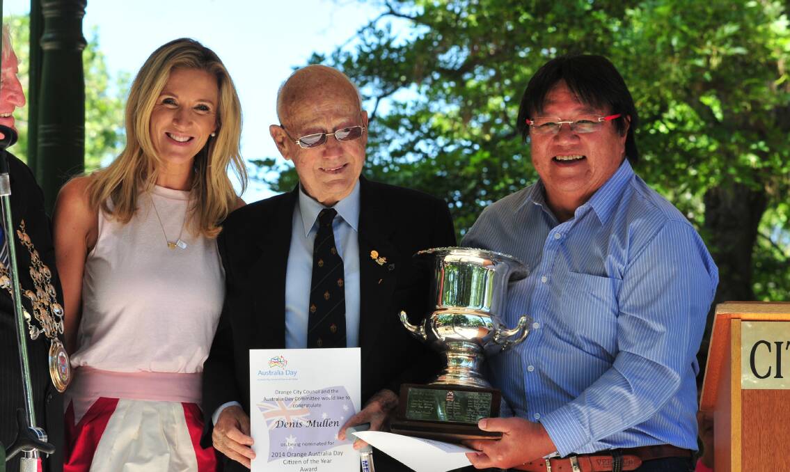 TWO’S COMPANY: Australia Day ambassador Jacinta Tynan congratulates Denis Mullen and Dr David Howe.      0126ausday39
