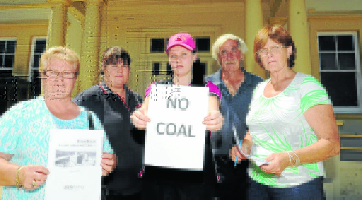 STANDING FIRM: Manildra residents Cheryl Bennett, Michelle Reimer, Maddie Press with Pat and Sue Williamson were not convinced that the proposed coal-fired steam boiler for Manildra should have their support at a community meeting on Tuesday night.  Photo: STEVE GOSCH 0130sgmanildra