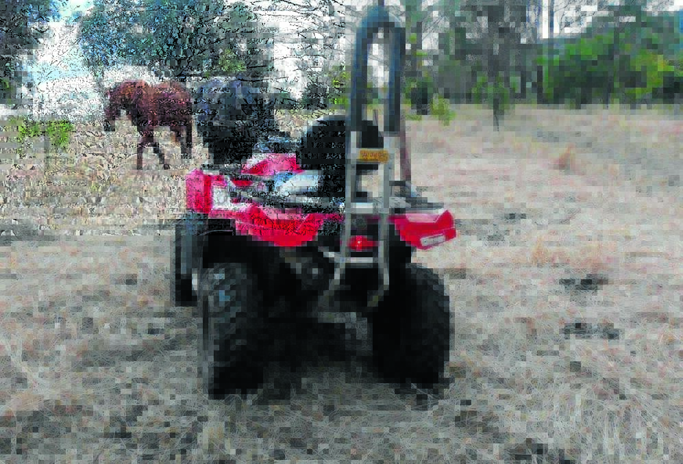TOO MANY INJURIES (right): Trauma director at Orange hospital Dr Brian Burns said more supervision is needed by parents over the safety of children and young people on quad bikes in the area following a spike in injuries. The model shown is fitted with protection to prevent rollover injuries.  