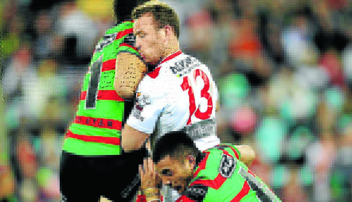 NO MORE: South Sydney superstar Greg Inglis sparked outrage after this head-high shoulder charge against Dean Young in season 2012. The NRL has banned the shoulder charge for the coming season, meaning no shoulder charges will be allowed in local rugby league.  