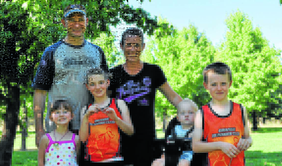 FAMILY AFFAIR: The Deans, (back) James and Sue, along with children (from left) Maeve, Lucy, Billy and Jack, will be competing in today's two kilometre dash. Sue will then run tomorrow's marathon. 			                 Photo: NICK McGRATH 0220nmrunning